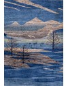 hand-knotted rug with landscape